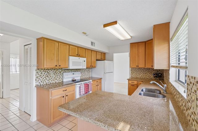 12769 Meadowbreeze Drive, Wellington, FL 33414