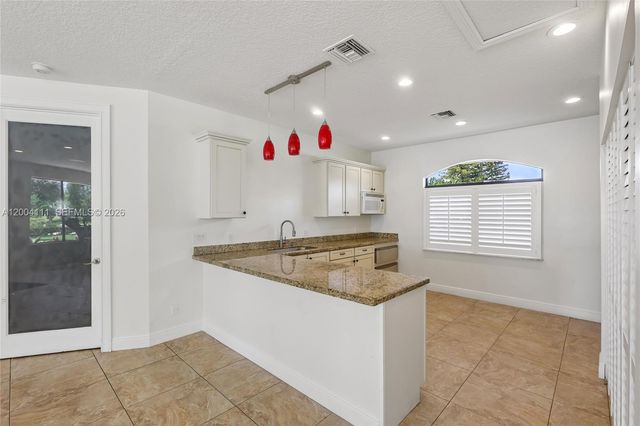 12769 Meadowbreeze Drive, Wellington, FL 33414