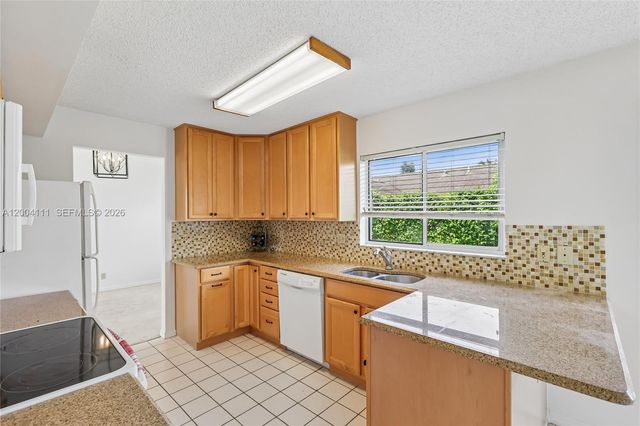 12769 Meadowbreeze Drive, Wellington, FL 33414