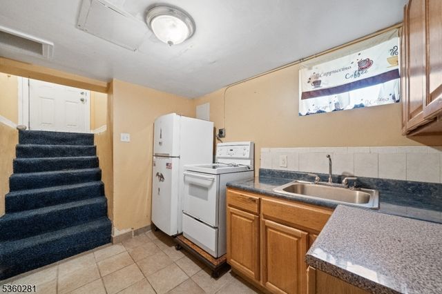 204 Burgess Pl, Passaic City, NJ 07055