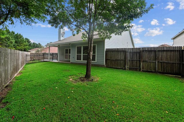 1069 Shadow Glenn Drive, Conroe, TX 77301