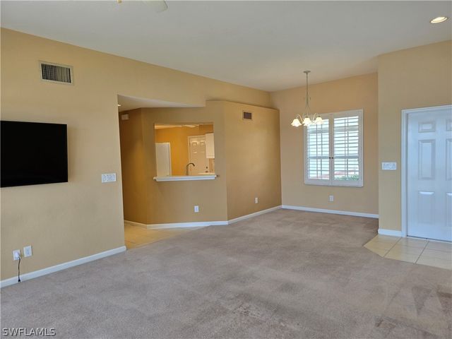 25069 Peacock LN 101, Naples, FL 34114