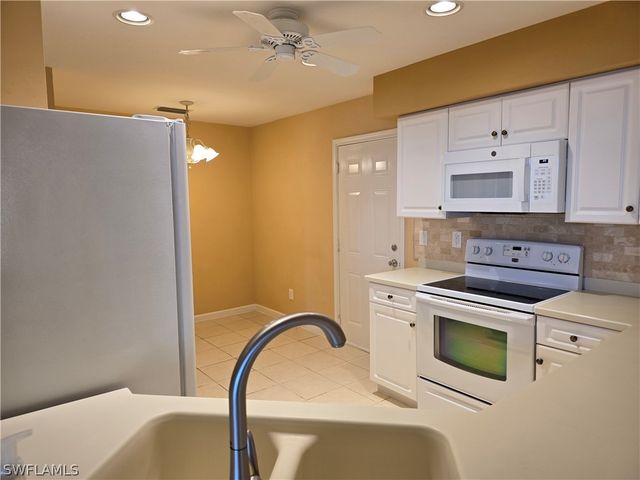 25069 Peacock LN 101, Naples, FL 34114