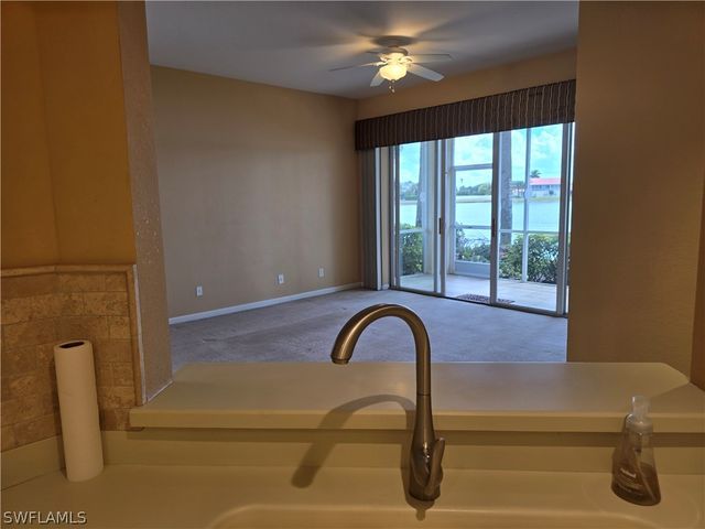 25069 Peacock LN 101, Naples, FL 34114