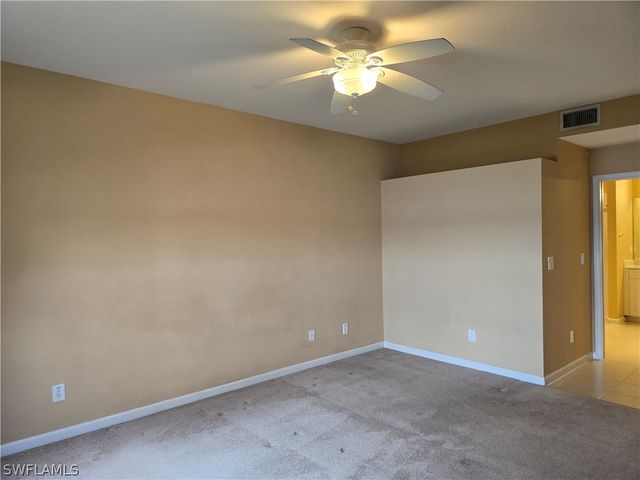 25069 Peacock LN 101, Naples, FL 34114