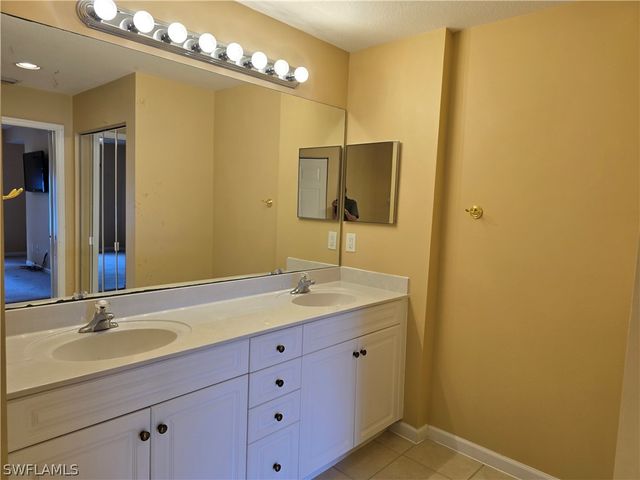 25069 Peacock LN 101, Naples, FL 34114