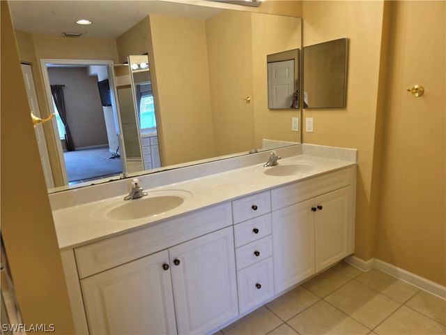 25069 Peacock LN 101, Naples, FL 34114