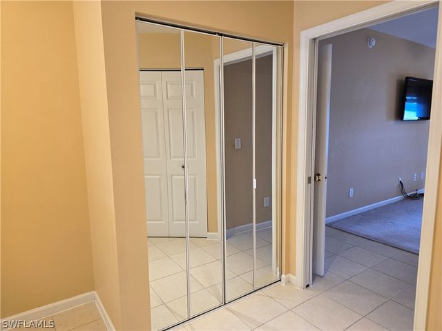 25069 Peacock LN 101, Naples, FL 34114