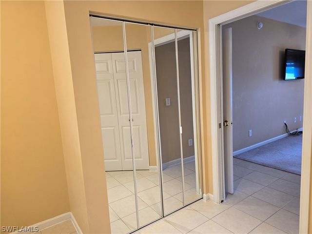 25069 Peacock LN 101, Naples, FL 34114