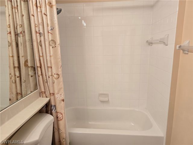 25069 Peacock LN 101, Naples, FL 34114