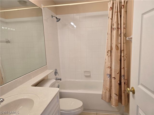 25069 Peacock LN 101, Naples, FL 34114