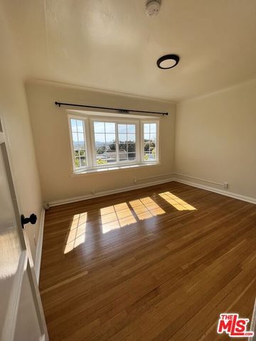 1306 S Longwood Avenue, Los Angeles, CA 90019