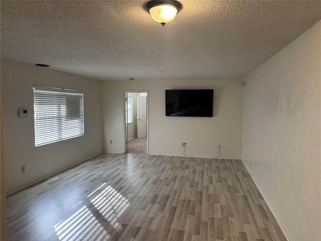 22 WINDTREE LANE 203, Winter Garden, FL 34787