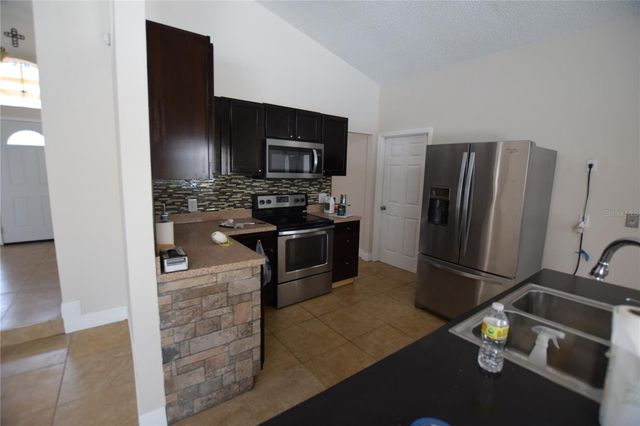 6952 KNIGHTSWOOD DRIVE, Orlando, FL 32818