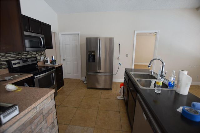 6952 KNIGHTSWOOD DRIVE, Orlando, FL 32818