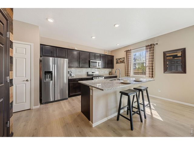 6835 Whisper Trail Ln, Wellington, CO 80549