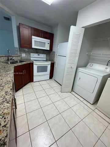 3457 NW 44th Street 104, Oakland Park, FL 33309