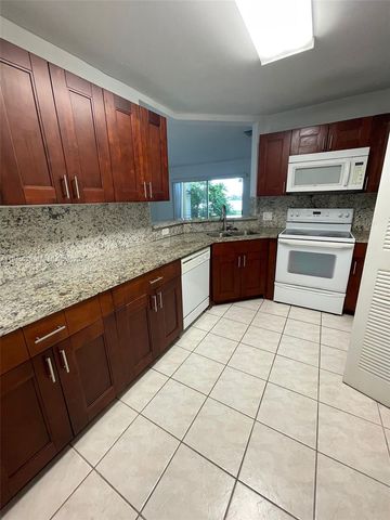 3457 NW 44th Street 104, Oakland Park, FL 33309