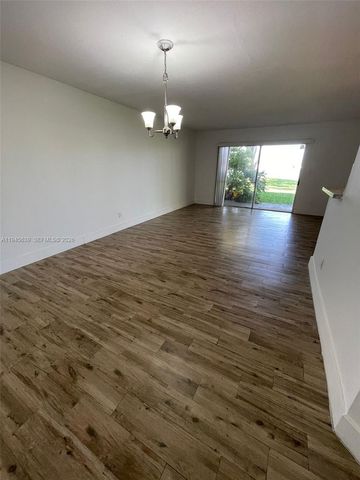 3457 NW 44th Street 104, Oakland Park, FL 33309