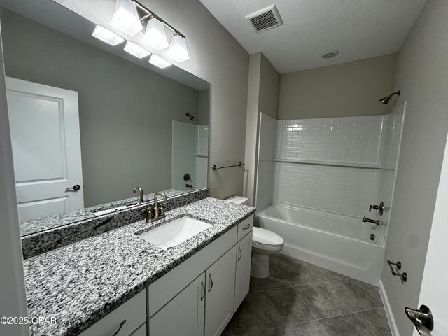 9022 Parrot Place, Panama City Beach, FL 32413