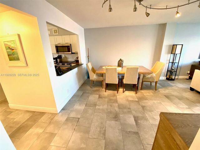 400 Golden Isles Dr 6, Hallandale Beach, FL 33009