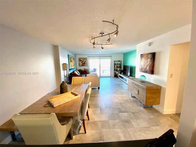 400 Golden Isles Dr 6, Hallandale Beach, FL 33009