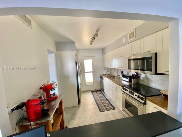 400 Golden Isles Dr 6, Hallandale Beach, FL 33009