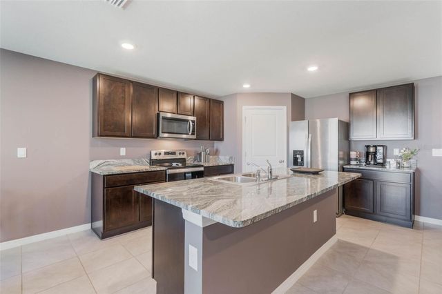 8595 TRIUMPH CIRCLE, Wildwood, FL 34785