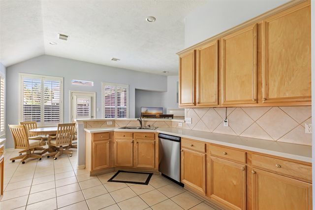 26924 Manor Falls Drive, Kingwood, TX 77339