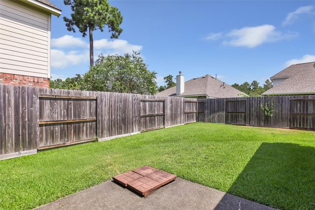 26924 Manor Falls Drive, Kingwood, TX 77339