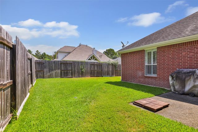 26924 Manor Falls Drive, Kingwood, TX 77339