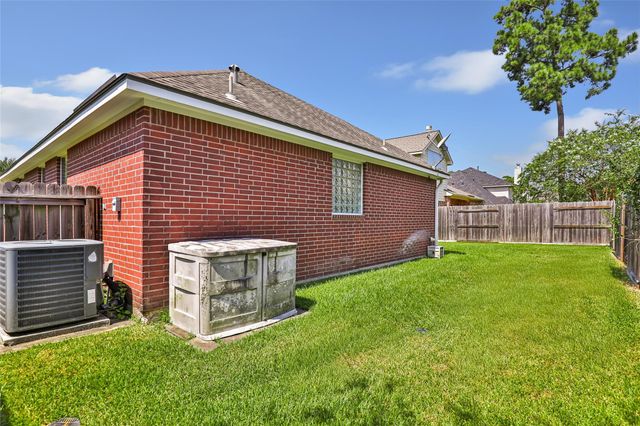 26924 Manor Falls Drive, Kingwood, TX 77339