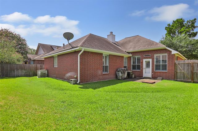 26924 Manor Falls Drive, Kingwood, TX 77339