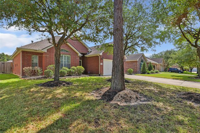 26924 Manor Falls Drive, Kingwood, TX 77339