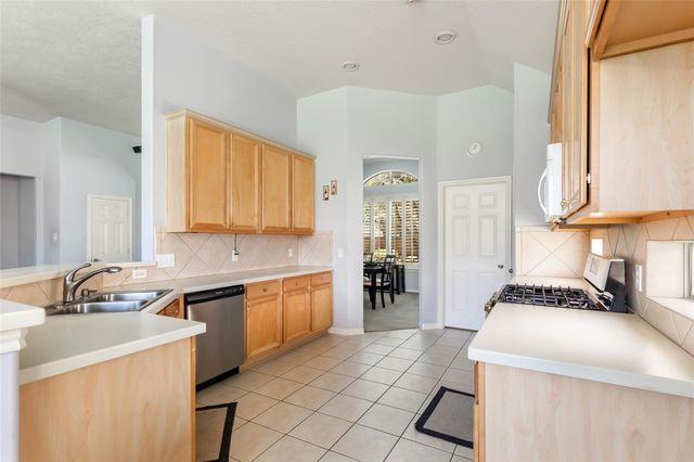 26924 Manor Falls Drive, Kingwood, TX 77339