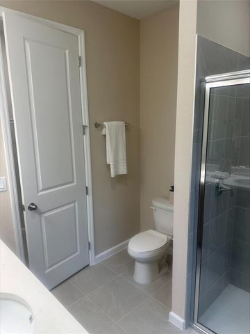 1026 SWAMP CHESTNUT LOOP, Lady Lake, FL 32159