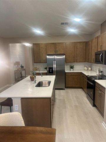 1026 SWAMP CHESTNUT LOOP, Lady Lake, FL 32159