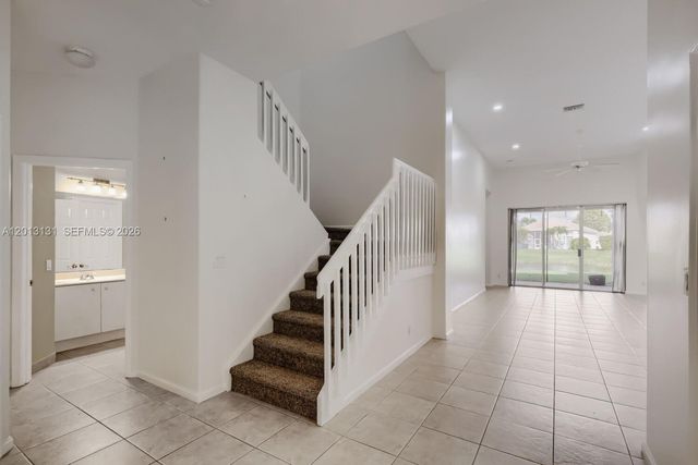 117 Palm Circle, Atlantis, FL 33462
