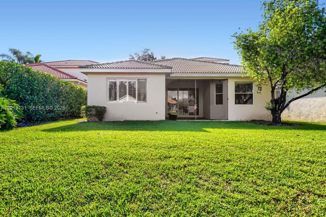 117 Palm Circle, Atlantis, FL 33462