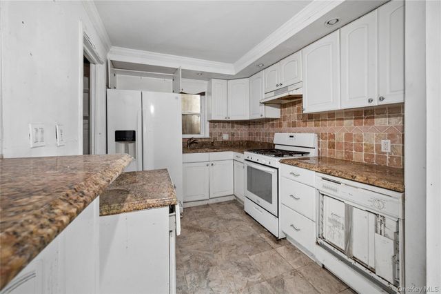 99 Wilson Avenue, Amity Harbor, NY 11701