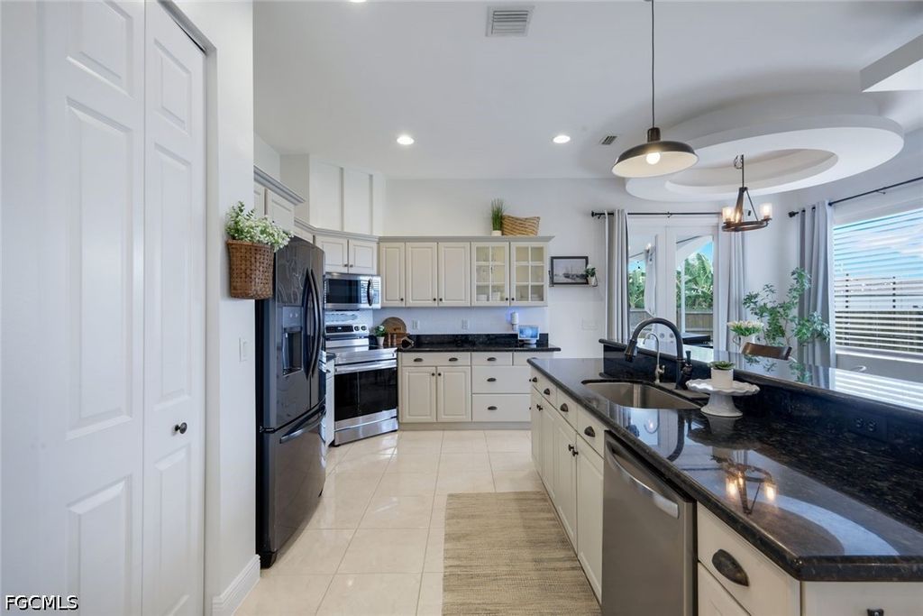 Image 12 of property listing at 1130 NW 14th TER, Cape Coral, FL 33993