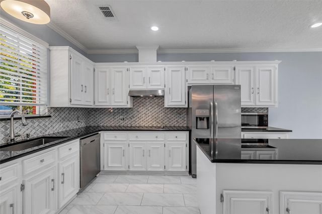 454 Stephen F Austin Drive, Conroe, TX 77302