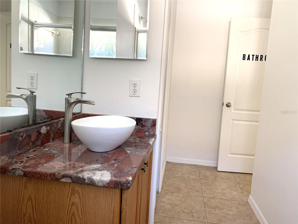 Image 9 of property listing at 8408 CANTERBURY LAKE BOULEVARD, Tampa, FL 33619