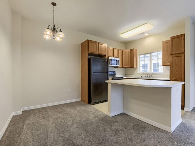 9551 Pearl Circle 203, Parker, CO 80134