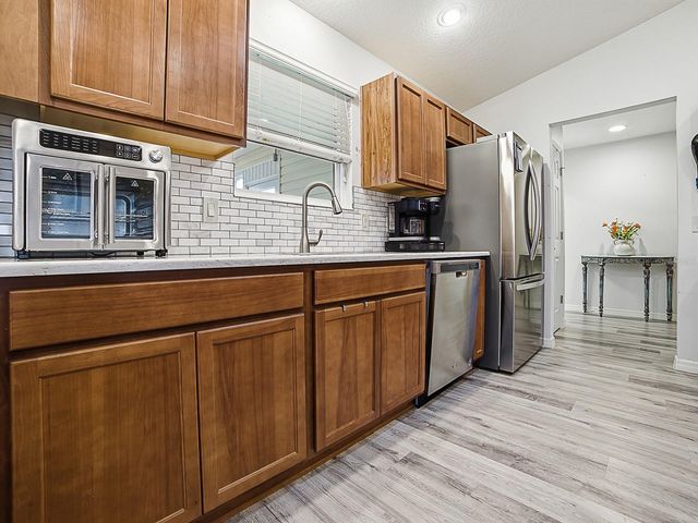 1033 ALOHA WAY, Lady Lake, FL 32159