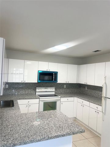 1244 NW 32nd Place 1244, Miami, FL 33125