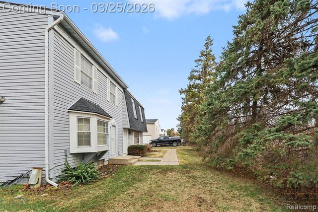 216 Lake Village Drive, Walled Lake, MI 48390