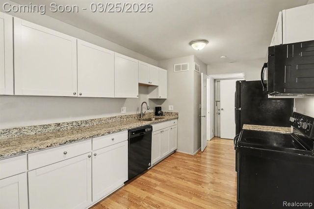 216 Lake Village Drive, Walled Lake, MI 48390