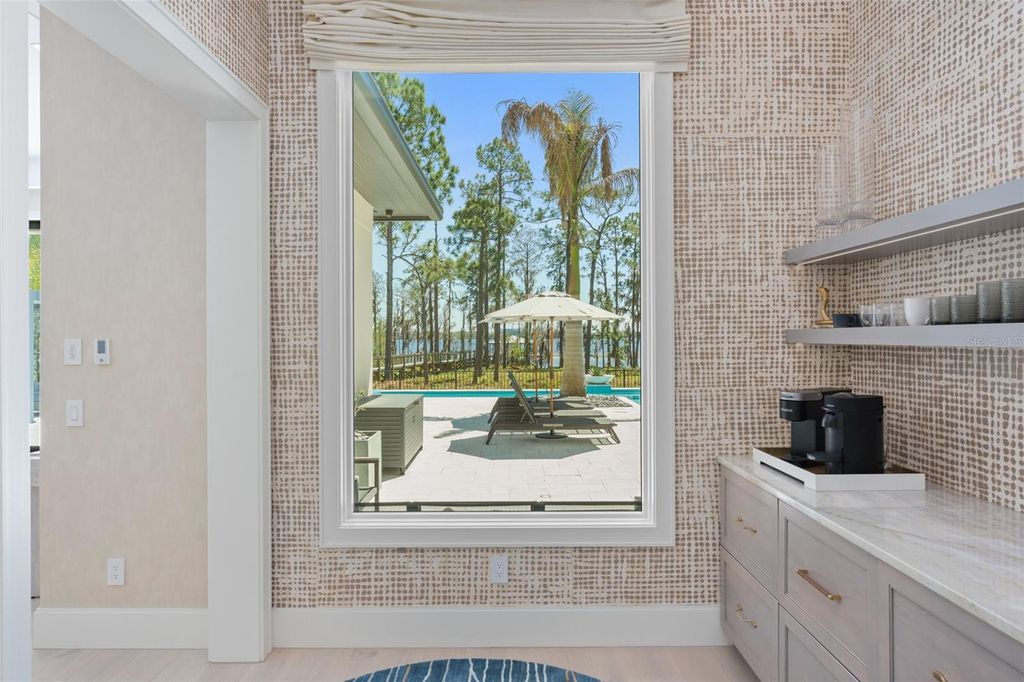 Image 28 of property listing at 8506 LAKE NONA SHORE DR, Orlando, FL 32827