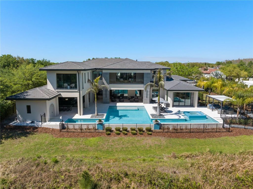 Image 74 of property listing at 8506 LAKE NONA SHORE DR, Orlando, FL 32827